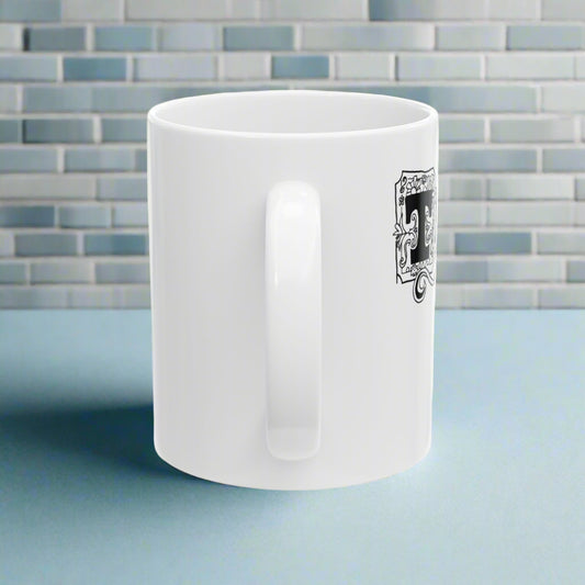 white mug on blue counter