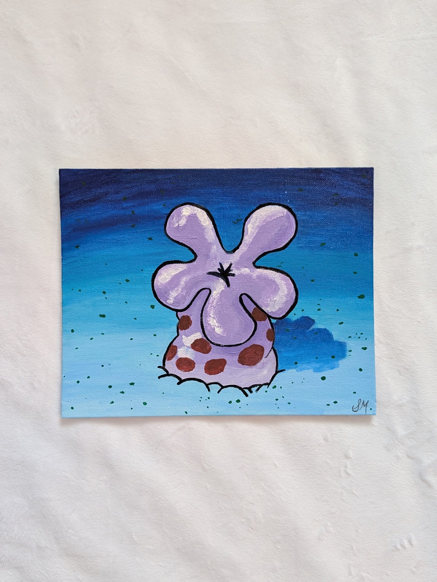 coral flower painting on soft white blanket