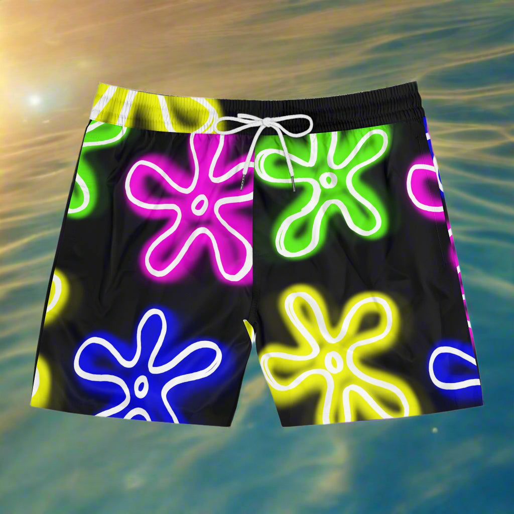 front view of black swimming trunks with white drawstring, featuring a bright neon flower pattern