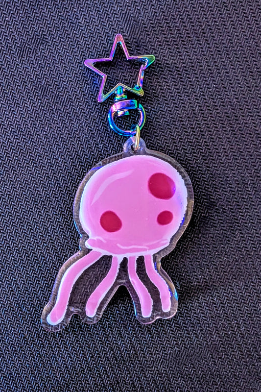 pink jellyfish keychain with an iridescent star ring