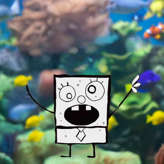 white doodle sticker underwater in front of some fish and coral