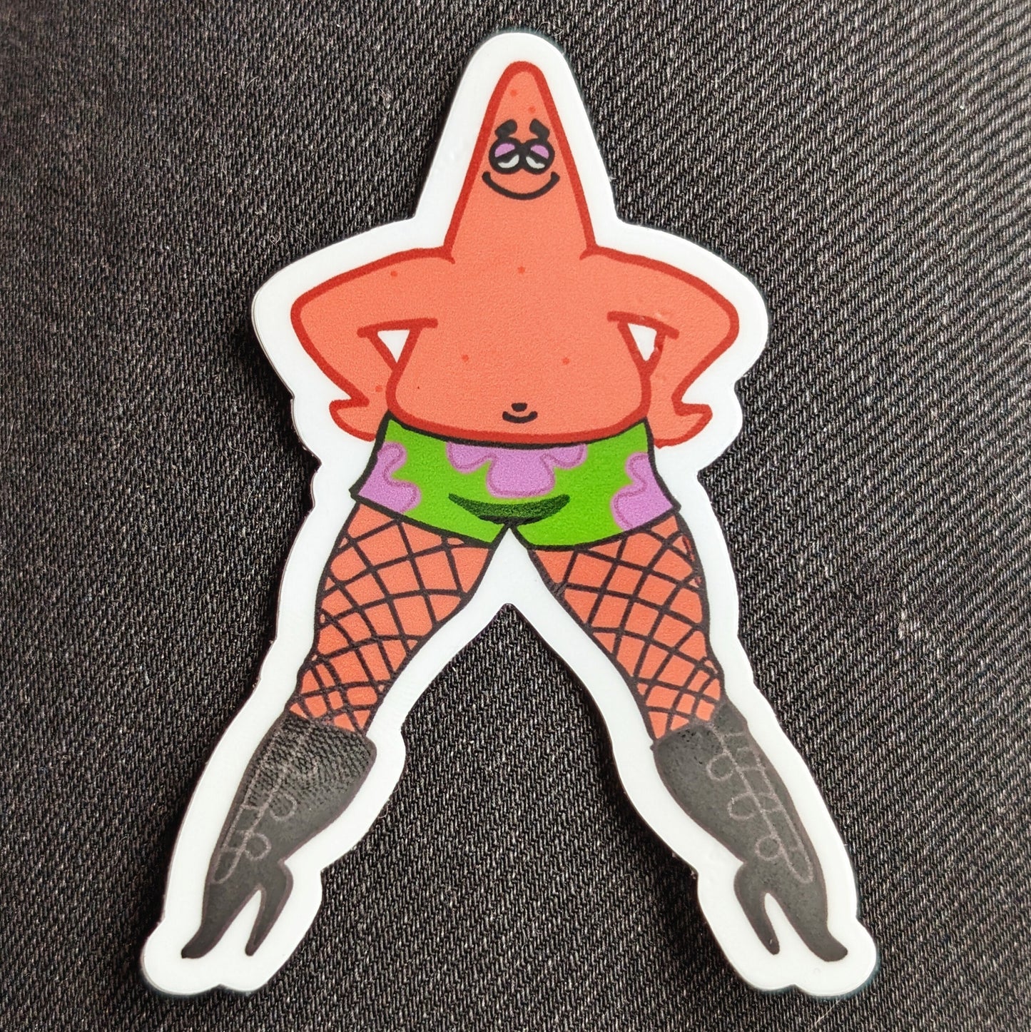pink starfish in heels sticker with black denim background