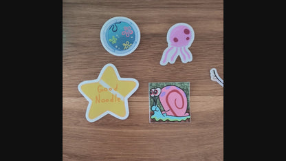 video panning across stickers inspired by the television show spongebob squarepants