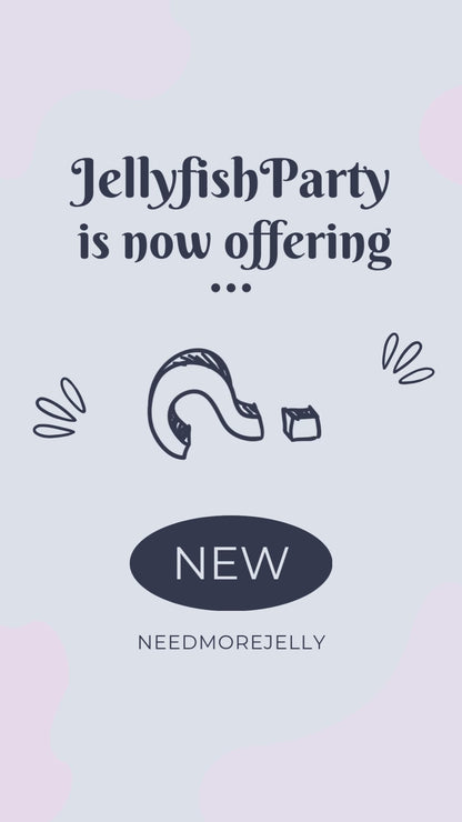 video reveal of JellyfishParty's NEEDMOREJELLY Small-batch Blackberry Jelly on a wooden outdoor display with white paint and a blurred out tree in the background. Blackberries are illustrated on a circle label with purple jelly inside a sealed jar with a golden lid.