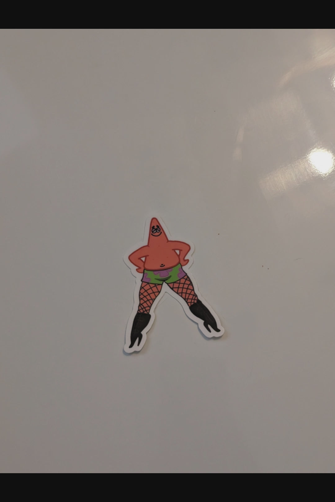 patrick in heels magnet thrown onto a white magnetic surface