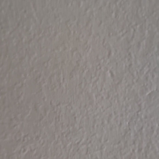 side panning video of blue window painting up close and then zoomed out