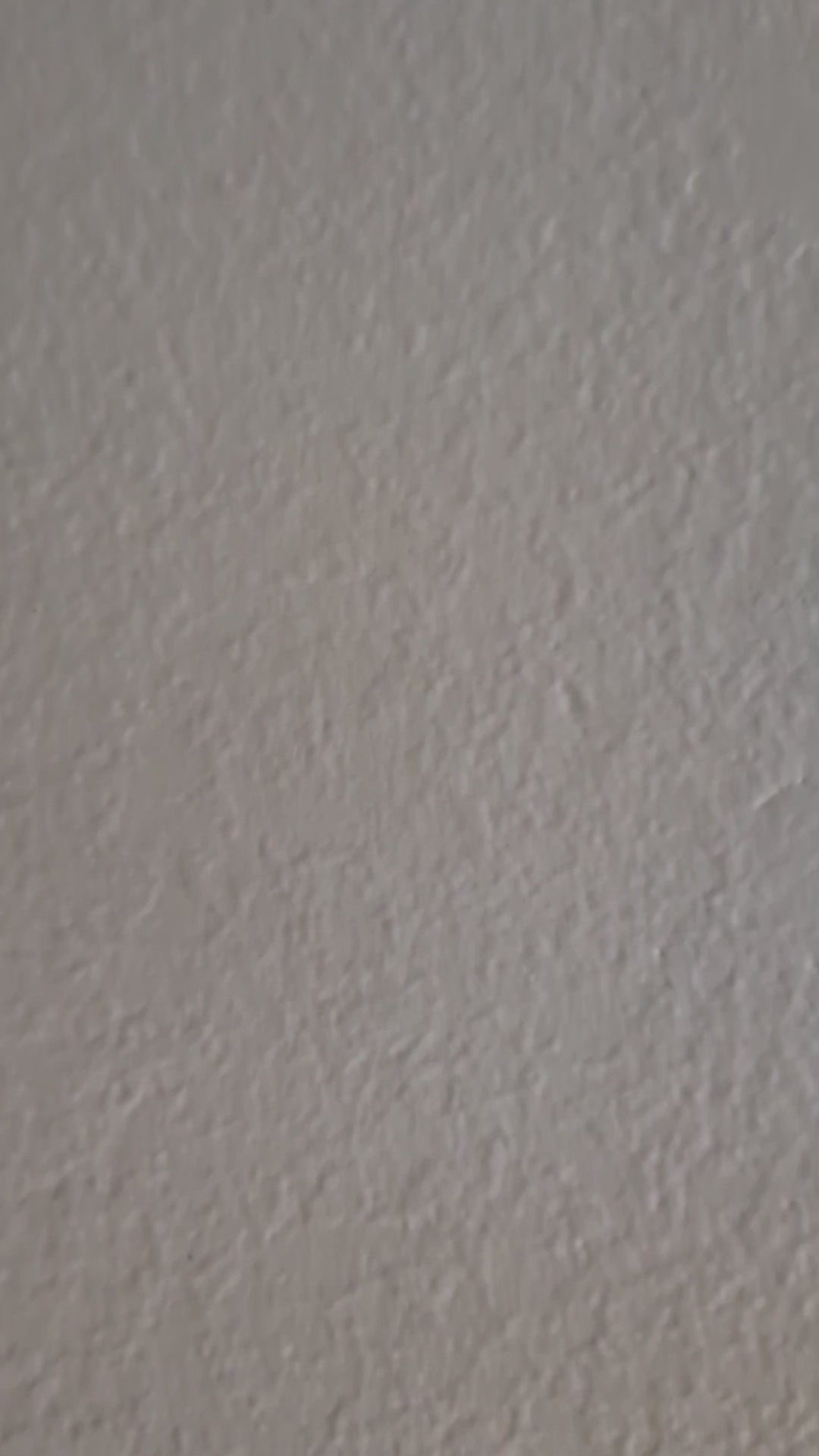 side panning video of blue window painting up close and then zoomed out