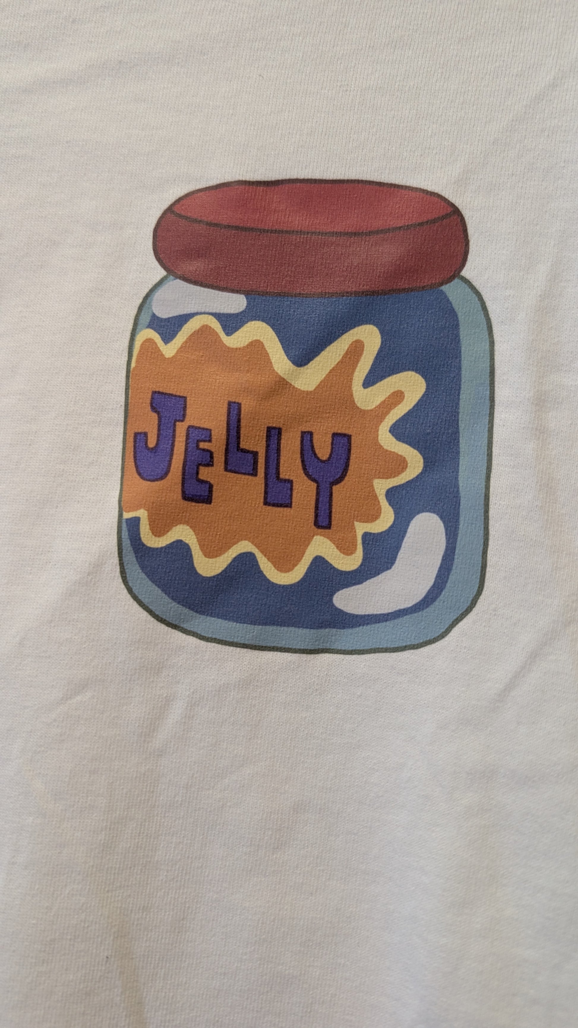 T-shirt with a jelly jar design on a beige background