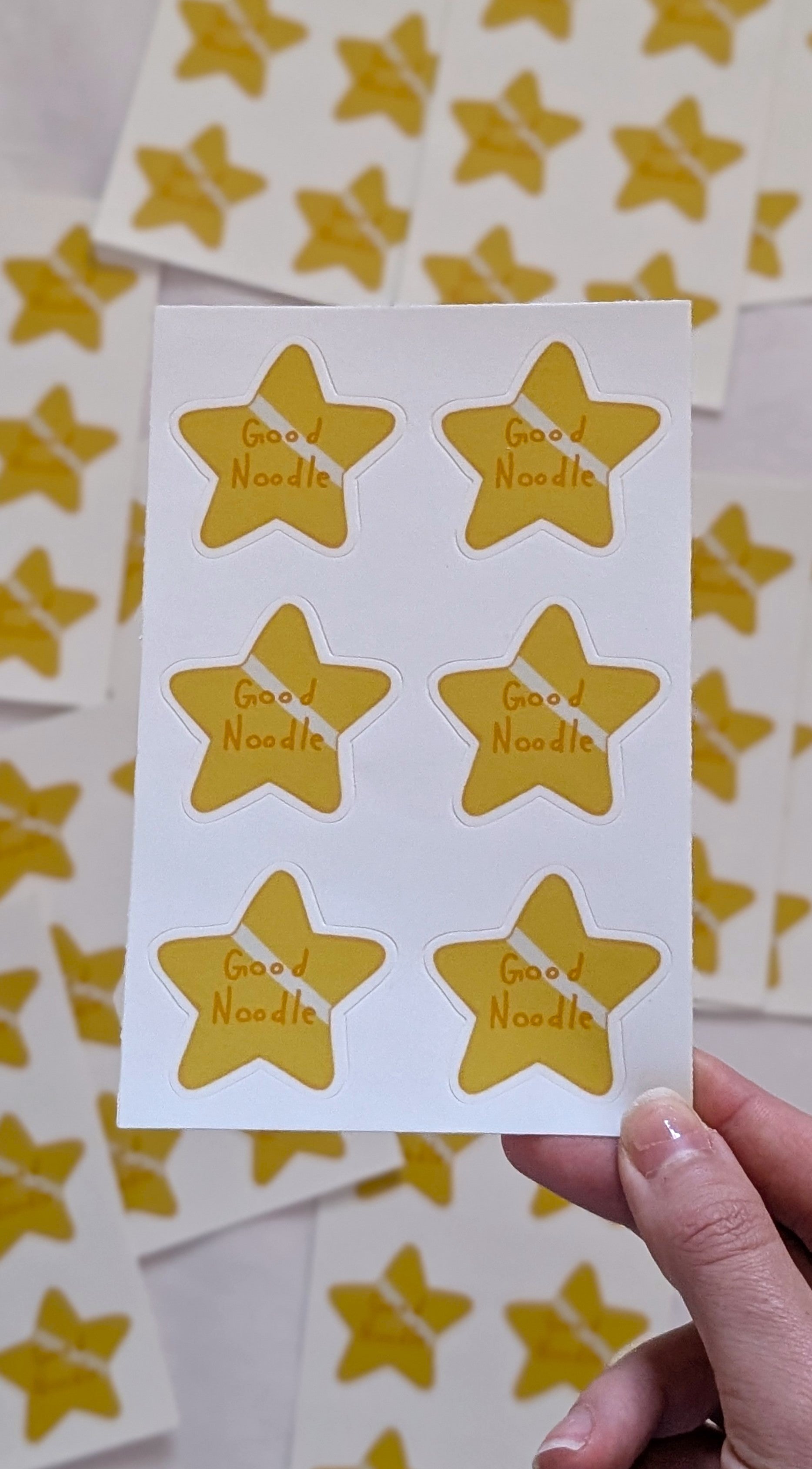 six count gold star sticker sheet that says Good Noodle across the stars